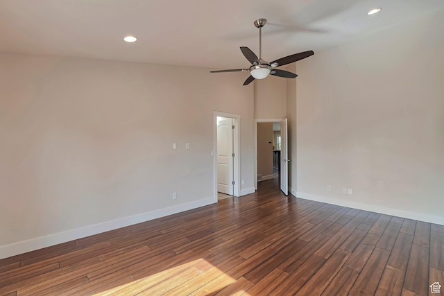 222 E 905 N, Orem, UT 84057 - spare room featuring baseboards, dark wood-style flooring, ceiling fan, recessed lighting, and lofted ceiling