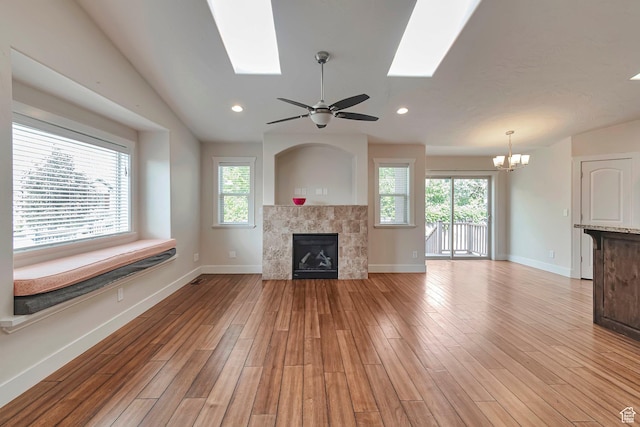 222 E 905 N, Orem, UT 84057 - unfurnished living room with a chandelier, a skylight, healthy amount of natural light, recessed lighting, and vaulted ceiling