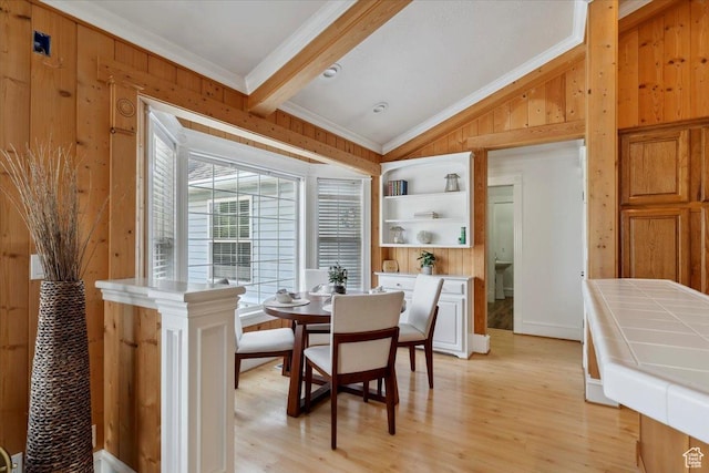 595 E 100 S, Morgan, UT 84050 - dining room with wood walls, crown molding, and light wood-style floors