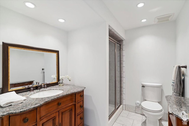 595 E 100 S, Morgan, UT 84050 - bathroom featuring vanity, toilet, a shower stall, and recessed lighting