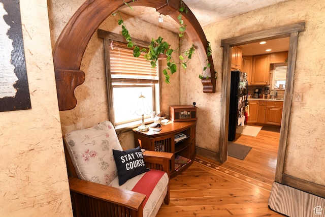 145 E 100 S, Farmington, UT 84025 - hallway with light wood-style floors and a sink