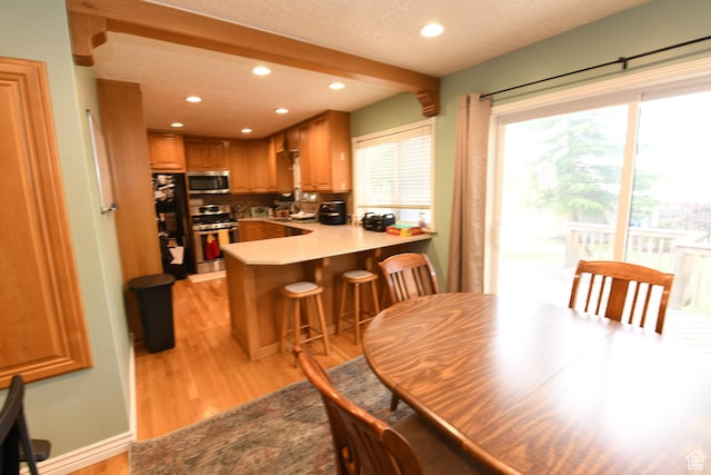 145 E 100 S, Farmington, UT 84025 - dining room featuring recessed lighting, light wood-type flooring, and a textured ceiling