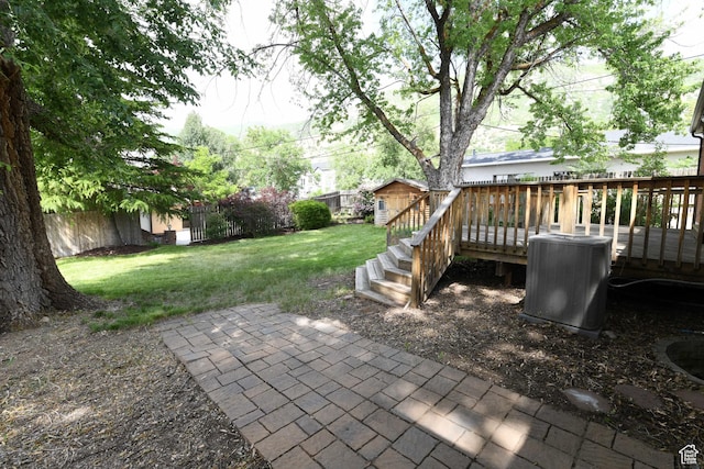 145 E 100 S, Farmington, UT 84025 - view of yard with central AC and a wooden deck