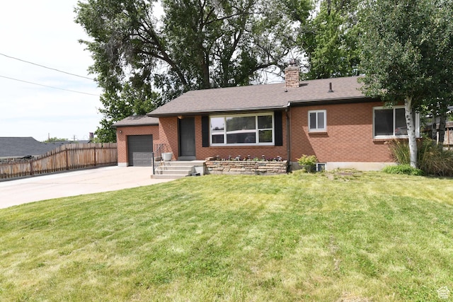 145 E 100 S, Farmington, UT 84025 - ranch-style house featuring concrete driveway, an attached garage, brick siding, and a chimney
