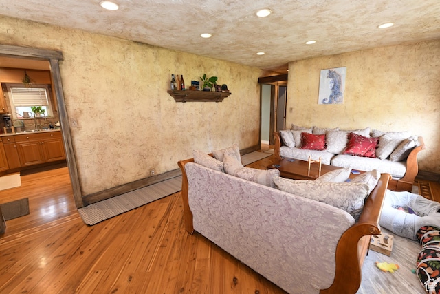 145 E 100 S, Farmington, UT 84025 - living area with light wood-style flooring, recessed lighting, and baseboards