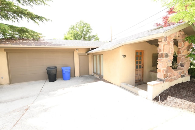 145 E 100 S, Farmington, UT 84025 - view of side of property with stucco siding and a garage