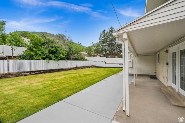 7585 S 3500 E, Salt Lake City, UT 84121 - view of yard with a patio area and a mountain view