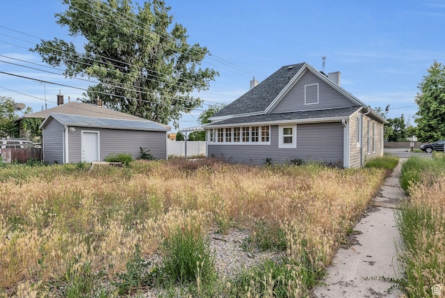 158 N 900 W, Provo, UT 84601 - view of side of home featuring an outdoor structure