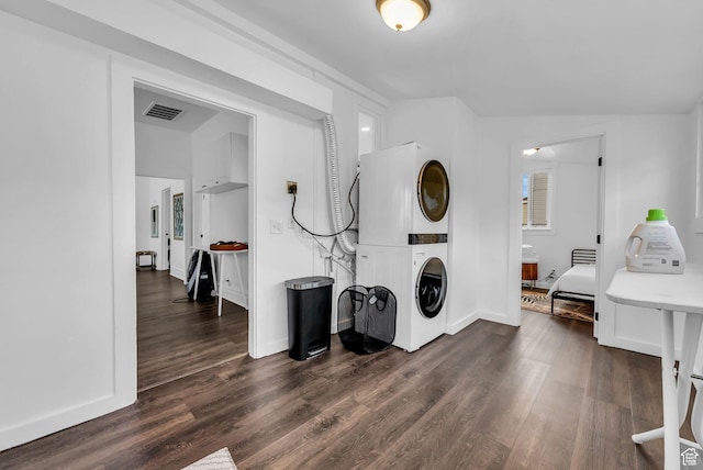 158 N 900 W, Provo, UT 84601 - laundry area featuring stacked washer / dryer, dark wood finished floors, and baseboards