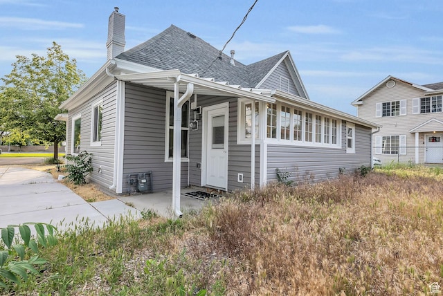 158 N 900 W, Provo, UT 84601 - view of front of property featuring a chimney and a shingled roof
