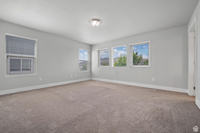 4959 Sagebrush Ln E, Eagle Mountain, UT 84005 - spare room featuring baseboards and carpet floors