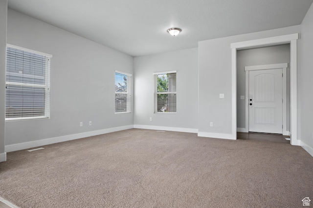 4959 Sagebrush Ln E, Eagle Mountain, UT 84005 - carpeted spare room featuring baseboards
