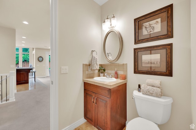 7195 S Villandrie Ln E, Cottonwood Heights, UT 84121 - bathroom featuring vanity, decorative backsplash, toilet, recessed lighting, and baseboards