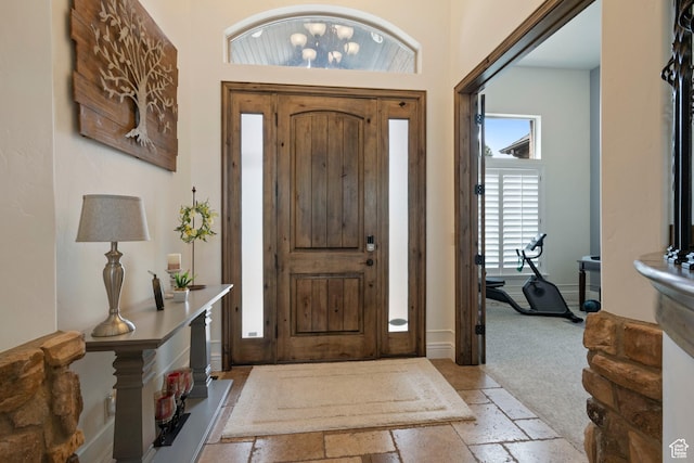 2908 W Bison Ridge Rd, South Jordan, UT 84095 - foyer entrance featuring stone tile flooring and baseboards