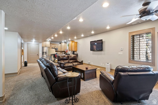 2908 W Bison Ridge Rd, South Jordan, UT 84095 - living room with a textured ceiling, recessed lighting, light colored carpet, a ceiling fan, and baseboards