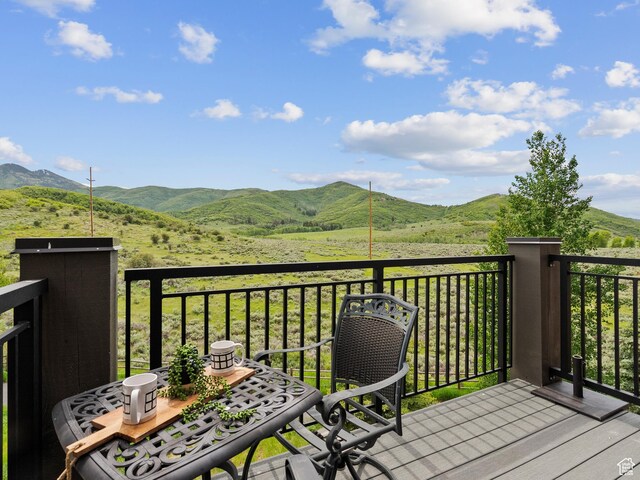 6749 N 2200 W Unit B-303, Park City, UT 84098 - balcony featuring a mountain view and outdoor dining area