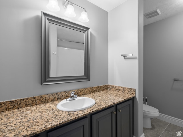 6749 N 2200 W Unit B-303, Park City, UT 84098 - bathroom featuring vanity, toilet, and baseboards