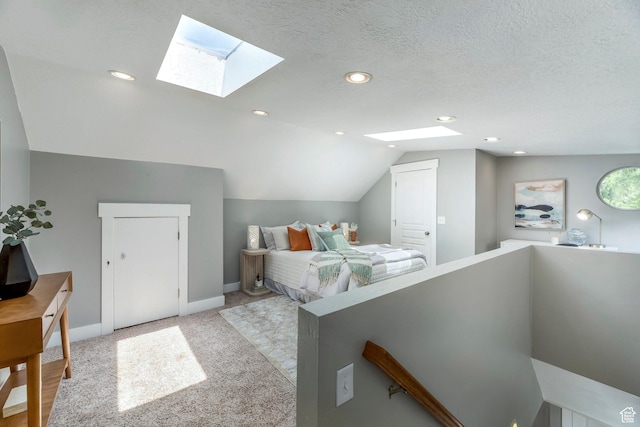 1860 S 800 E, Salt Lake City, UT 84105 - bedroom featuring a skylight, lofted ceiling, light carpet, baseboards, and recessed lighting