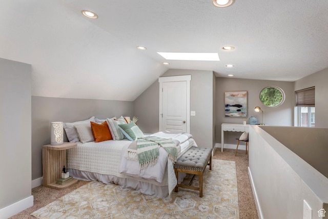1860 S 800 E, Salt Lake City, UT 84105 - bedroom featuring lofted ceiling, light colored carpet, a skylight, baseboards, and recessed lighting