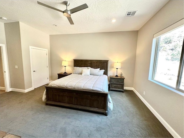 108 Trapper Cir Unit A, Springdale, UT 84767 - bedroom featuring carpet flooring, baseboards, ceiling fan, and a textured ceiling