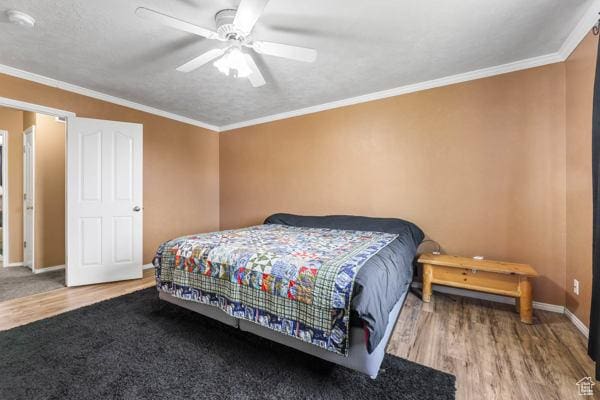 755 E 890 N, Tooele, UT 84074 - bedroom featuring wood finished floors, baseboards, ornamental molding, and ceiling fan