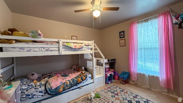 140 W 200 N, Price, UT 84501 - bedroom featuring wood finished floors, multiple windows, and ceiling fan
