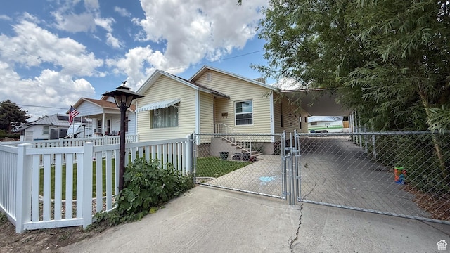 140 W 200 N, Price, UT 84501 - view of front of property featuring a gate, a carport, and concrete driveway