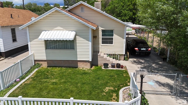 140 W 200 N, Price, UT 84501 - view of front of property featuring driveway, a gate, and a chimney