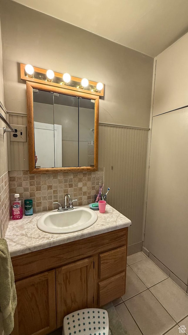 140 W 200 N, Price, UT 84501 - bathroom with vanity, tile patterned flooring, and a wainscoted wall