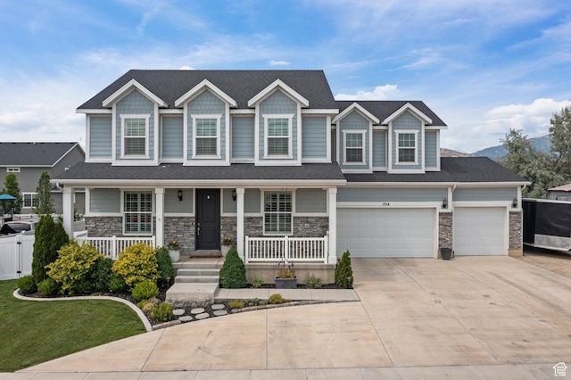 1314 W 1550 N, Lehi, UT 84043 - craftsman inspired home featuring covered porch, driveway, stone siding, and a garage