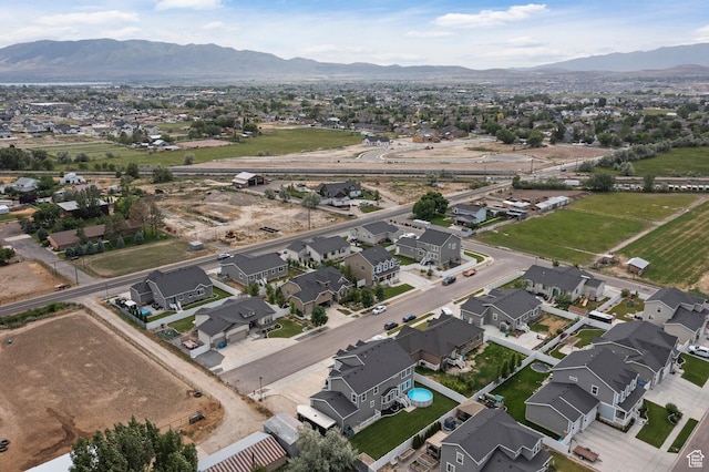 1314 W 1550 N, Lehi, UT 84043 - aerial view of property and surrounding area featuring a mountainous background and nearby suburban area