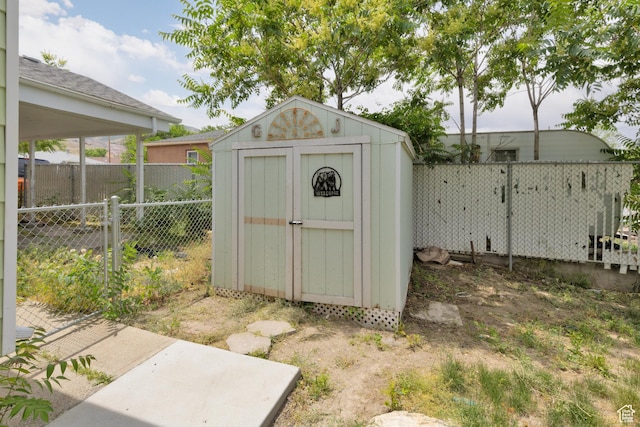 8750 W Helen Dr N, Magna, UT 84044 - view of shed featuring a fenced backyard