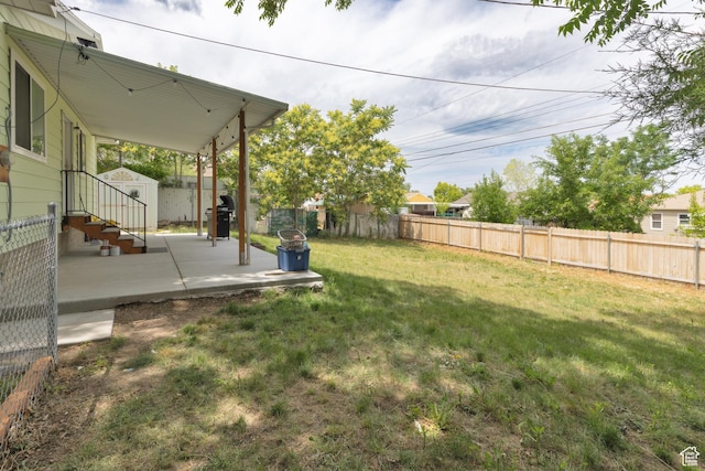 8750 W Helen Dr N, Magna, UT 84044 - view of yard featuring a patio area