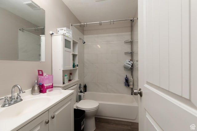 8750 W Helen Dr N, Magna, UT 84044 - full bathroom with vanity,  shower combination, toilet, and wood finished floors