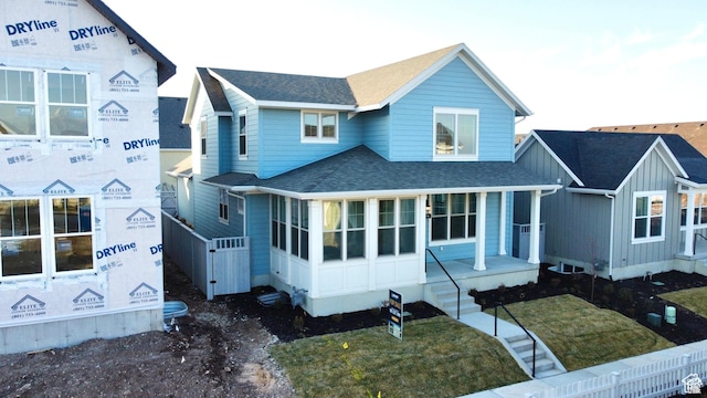 11208 S Easy Bee St Unit 268, South Jordan, UT 84009 - view of front facade featuring roof with shingles and covered porch