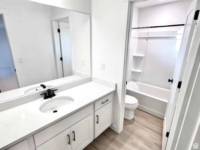 11208 S Easy Bee St Unit 268, South Jordan, UT 84009 - full bath featuring toilet, vanity, wood finished floors, and tub / shower combination