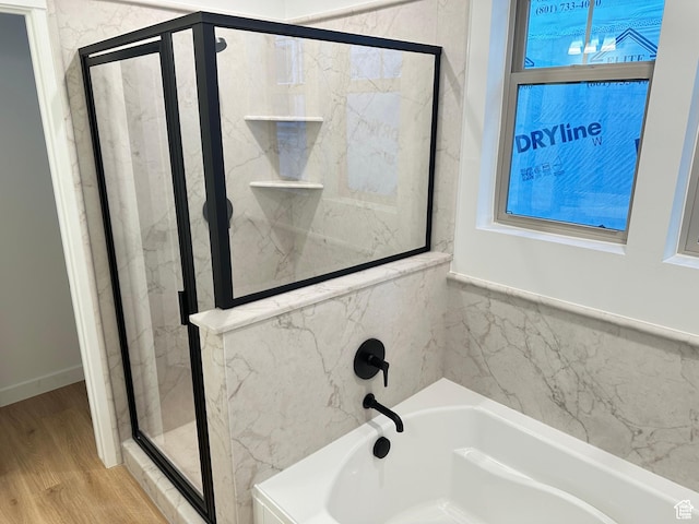 11208 S Easy Bee St Unit 268, South Jordan, UT 84009 - full bathroom with a garden tub, a marble finish shower, and wood finished floors