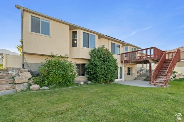 3972 S Lake Vista Dr, Saratoga Springs, UT 84045 - rear view of house featuring a wooden deck, stairway, stucco siding, and a patio area