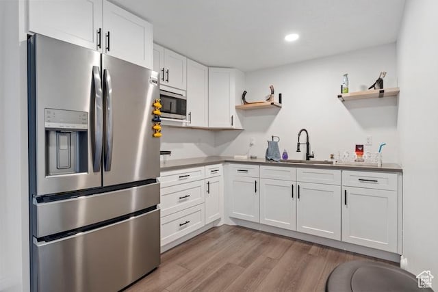 3972 S Lake Vista Dr, Saratoga Springs, UT 84045 - kitchen featuring stainless steel appliances, open shelves, a sink, white cabinets, and recessed lighting