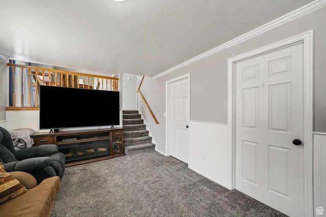 593 N 680 W, Tooele, UT 84074 - carpeted living room featuring stairway and crown molding