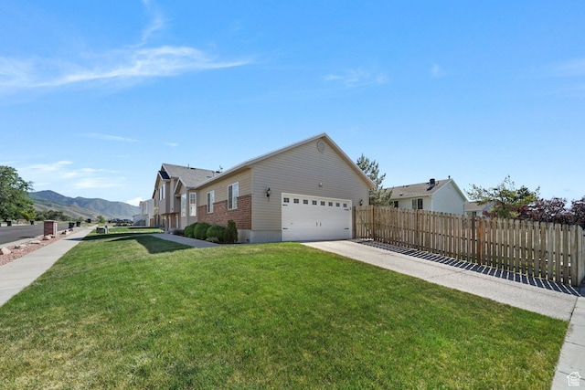 593 N 680 W, Tooele, UT 84074 - view of side of home featuring driveway and brick siding