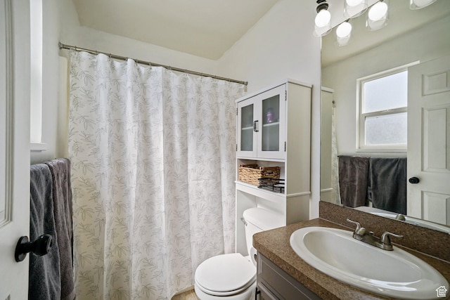 593 N 680 W, Tooele, UT 84074 - full bathroom featuring vanity, toilet, and curtained shower