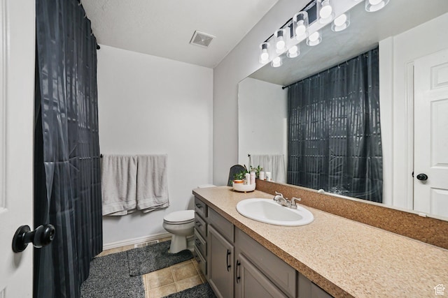 593 N 680 W, Tooele, UT 84074 - full bathroom featuring vanity, toilet, tile patterned flooring, curtained shower, and baseboards