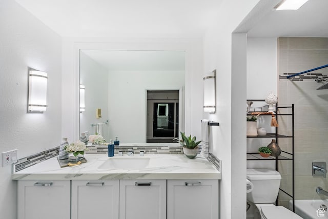42 Benchmark Vlg, Tooele, UT 84074 - full bathroom featuring vanity, toilet, and shower / bathtub combination