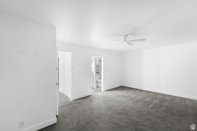 42 Benchmark Vlg, Tooele, UT 84074 - spare room featuring dark carpet, ceiling fan, and baseboards