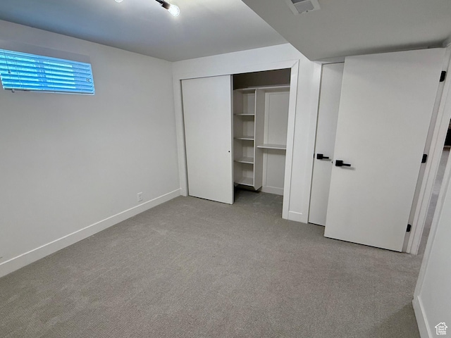 573 E 1600 S, Bountiful, UT 84010 - unfurnished bedroom featuring baseboards, carpet floors, and a closet