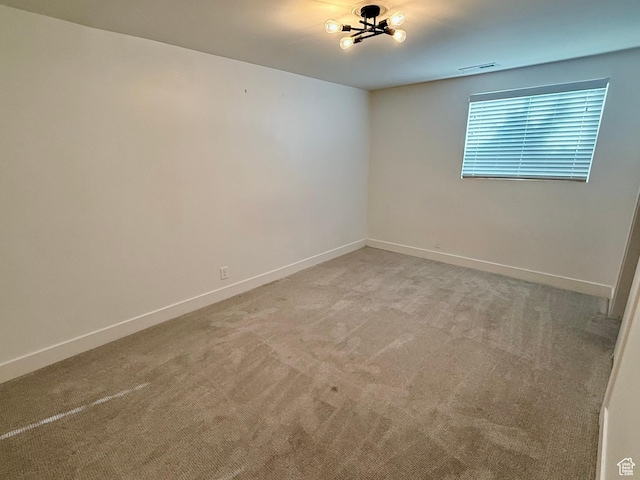 573 E 1600 S, Bountiful, UT 84010 - spare room featuring light colored carpet and baseboards