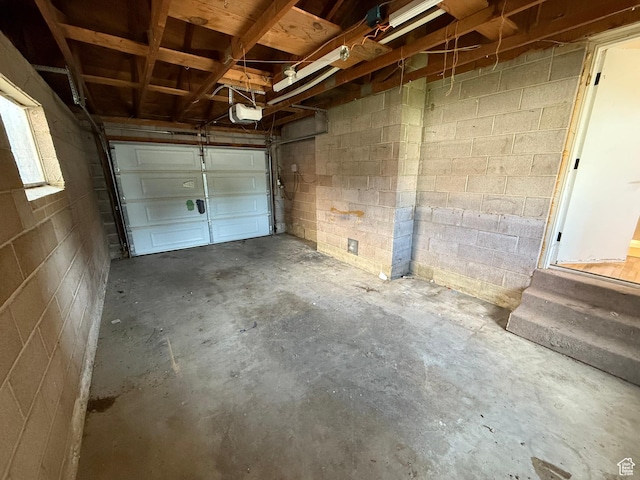 573 E 1600 S, Bountiful, UT 84010 - garage with a garage door opener and concrete block wall