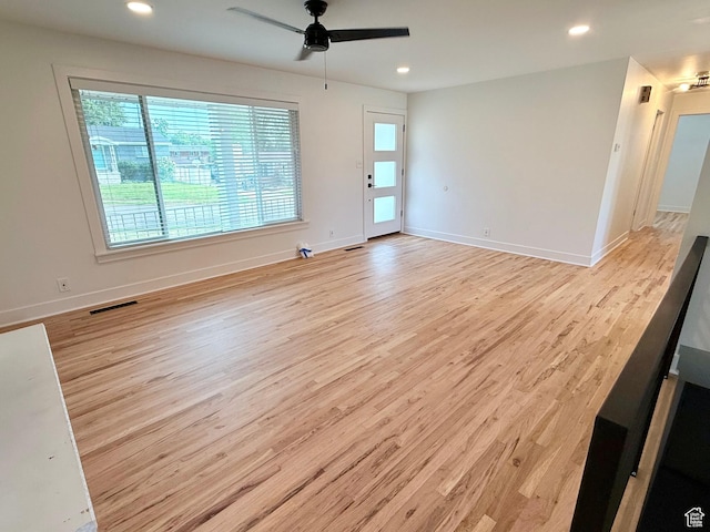 573 E 1600 S, Bountiful, UT 84010 - unfurnished room with healthy amount of natural light, wood finished floors, a ceiling fan, and recessed lighting