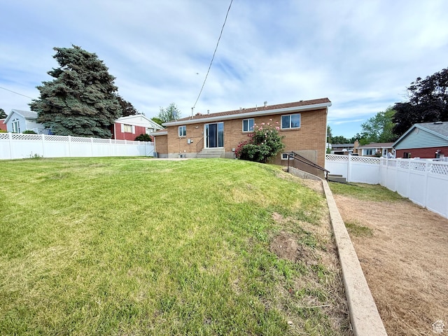 573 E 1600 S, Bountiful, UT 84010 - rear view of house featuring entry steps and brick siding